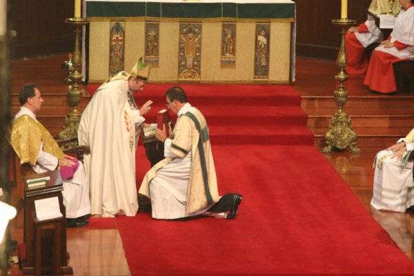 Subdeacon receives blessing from the presiding Bishop