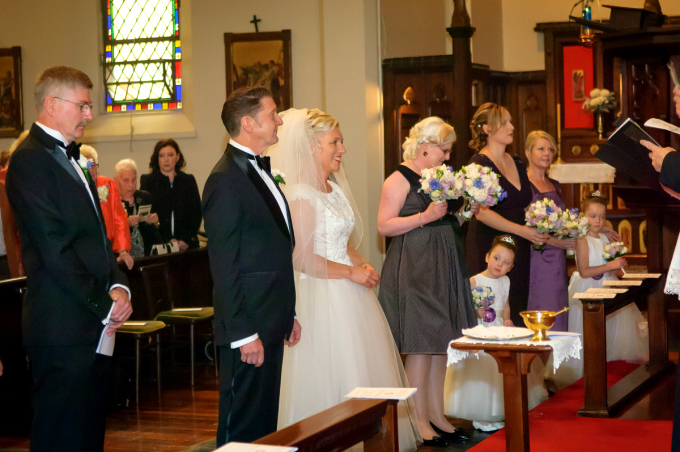 Wedding party at the altar rail